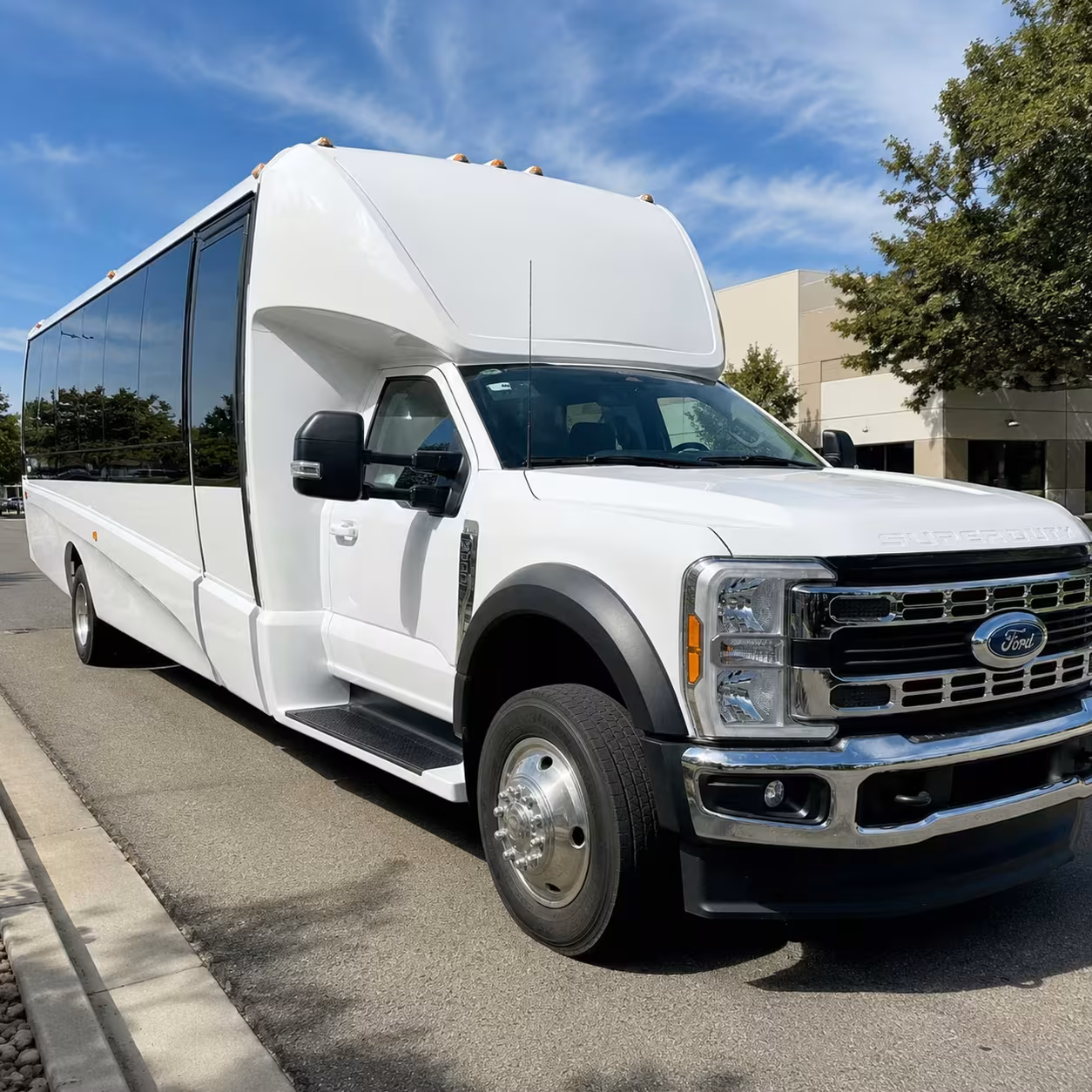 arvada minibus rentals for concerts at empower field and coors field